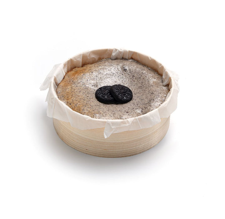 Tarta individual de queso estilo americano con galleta de chocolate y crema de vainilla